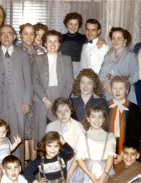 Grandma with a lot of family around